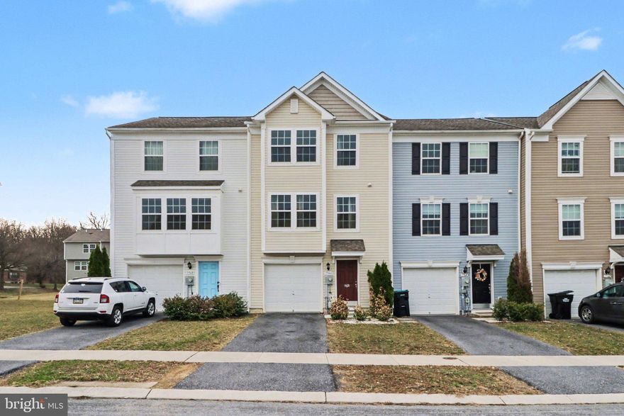 Welcome to this well-maintained 3-bedroom, 2.5-bath townhouse offering 2,006 square feet of living space across three levels, located in a desirable and well-established community. The entry level features garage access, a laundry room with washer and dryer, and a walkout basement area that provides additional flexible space. Plumbing is also in place for a future half bathroom. The main level offers an open layout with a spacious living room, kitchen, and dining area, along with a bright sunroom that brings in plenty of natural light. A convenient half bathroom is also located on this floor. The upper level includes three bedrooms and two full bathrooms, including a spacious primary suite with a private bath. This home offers a functional layout and is conveniently located close to shopping, dining, and major commuter routes in a quiet and welcoming community.