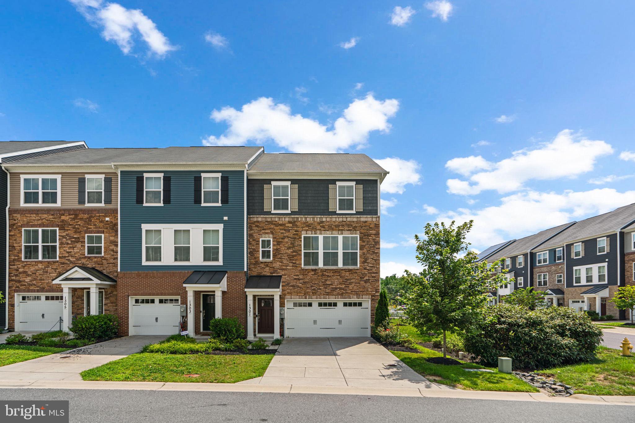 Welcome to this well-maintained 4-level home in the sought-after Riverwalk community, offering an open-concept layout perfect for modern living. The stylish kitchen features a center island with bar stool seating, granite countertops, stainless steel appliances including a microwave range hood, and a glass door wine cabinet/pantry. The adjacent family room is warm and inviting with a gas fireplace, while the main-level home office/sunroom—accessed through French doors—adds flexibility and function. A convenient half bath completes the main level.
Upstairs, you'll find three spacious bedrooms, including an owner's suite with a large closet and private ensuite bathroom with a double sink vanity. A hallway full bath and laundry nook add everyday ease.
The top-level offers a versatile bonus space that can be used as a bedroom or flex room, featuring a large closet, half bath, and access to a private rooftop patio—perfect for relaxing or entertaining.
The lower level includes the main entrance, garage access, a full bathroom, and an additional room ideal for a fourth bedroom, home office, or den.
Additional highlights include a front-entry garage. The community backs to serene green space and a conservation area, offering a peaceful natural setting. Conveniently located just a short distance from restaurants, coffee shops, and banks, with easy access to major commuter routes