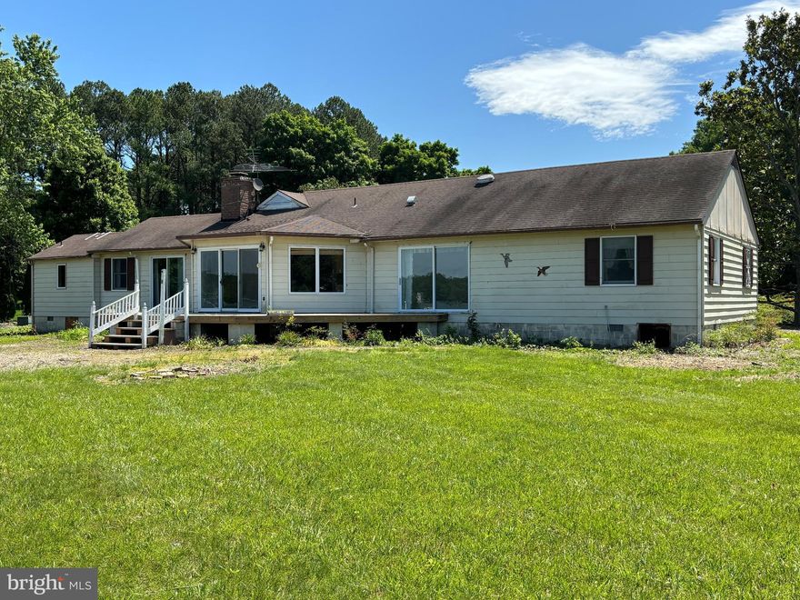 Top location off Bailey's Neck, Road about three miles from Easton and seven miles from Oxford.  Fabulous water views. Year-round sunsets. Setback line shown on old plat was changed to accommodate existing residence; new plat included in documents.  Do not go out on the existing dock; danger of falling through.  Permit pending for replacement of dock.  Cove is kept dredged to 3 to 4 ft MLW. Dredged depth continues to dock. Buyer may test depth to Buyer's satisfaction.  Shoreline is fully rip-rapped.
Seller had the well capped off and had Delmarva disconnect the electric service.
 By deeded covenant no short-term rentals are allowed at Peachblossom Point.
 House needs major renovation but was well built in 1977. Needs new kitchen, bathrooms, flooring, probably remove the wall between kitchen and family room. But the house has an excellent floorplan.  All carpet has been removed.  High land, sandy soil. 2024 perk for 5 bedrooms HAS BEEN APPROVED by TCDeptEH..     All appliances are included but offered in AS IS CONDITION, probably not working.  Seller is tagging some heirloom shrubs that are excluded from the sale, to be moved in the Fall.