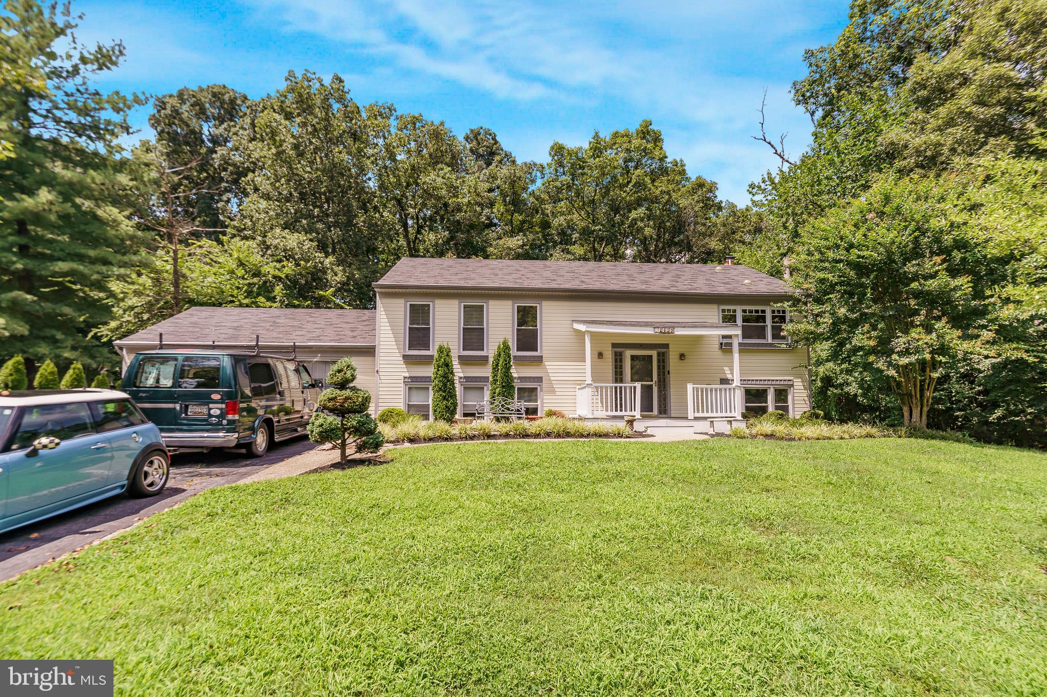 Welcome to this lovely home in the highly sought after community of Mills Farm! This lot was listed as a premium lot when built. Enjoy the backyard with the custom built pavilion with a built in grill. Hangout on your screened in porch and enjoy the view, this house backs up to Aberdeen Park. The upstairs has 3 bedrooms and 2 baths. Large open kitchen/living room, great for entertaining. Downstairs 2 more bedrooms and a full bath. The downstairs has a full kitchen and a walkout entrance to the backyard. This is a wonderful house in a great location. don't miss this opportunity!!