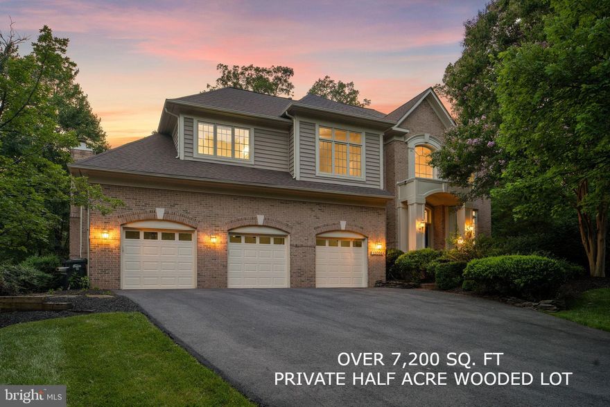 ***OVER 7,200 square feet***3 CAR GARAGE***PRIVATE, WOODED HALF ACRE LOT*** 

Welcome to 12016 Creekbend Road, a truly exceptional and elegant all-brick estate home with over 7,200 sq ft of living space, a 3-car garage, nestled on a private half-acre wooded lot backing directly onto the tranquil Sugarland Run Stream Valley Park, providing you with an unparalleled sense of privacy and serenity. Ideally located just 10 minutes from Dulles International Airport, 2 miles from the Metro to DC, and close to the Reston Town Center and Reston Hospital, this home combines the best of luxury and convenience. Situated in one of Reston’s most desirable neighborhoods, you’re just minutes away from outdoor trails, scenic lakes, schools, shopping, and easy commuter access.

Main Level Living:
As you enter through the grand double doors, you are greeted by a dramatic two-story foyer with custom tile details, setting the tone for the open and airy layout. The main floor is filled with natural light and includes a formal living room, a spacious dining room, and a private home office. The inviting family room features one of the home’s two fireplaces, making it the perfect space to unwind. The newly updated kitchen is a chef's dream, boasting high-end cabinetry, sleek granite countertops, a gas cooktop with grill, and seamless access to an expansive deck—ideal for entertaining guests or enjoying a quiet evening outdoors.

Upper-Level Retreat:
Upstairs, you’ll find four generously sized bedrooms and three full bathrooms, including a stunning primary suite. The master bath offers a spa-like experience with dual vanities, a soaking tub, a separate shower, and a walk-in closet. A versatile bonus room connects to the primary suite, perfect for a second office, nursery, or a custom closet space, allowing you to personalize this sanctuary to fit your lifestyle.

Finished Lower Level:
The walk-out basement is designed for both relaxation and entertainment. It includes two additional bedrooms, a full bath, a large recreational space, and a second home office. For movie lovers, the private home theater with two-tiered seating and premium surround sound is the ultimate retreat. This basement area is ideal for hosting guests or providing a comfortable living space for extended family members.

Impressive Upgrades:
In the last five years, the current owners have made over $150,000 in enhancements to elevate this home, including:

New roof (2024)

All garage doors replaced (2024)

French drain system installed in the front yard

Updated driveway

New HVAC systems (both heating and cooling)

Plumbing fixtures replaced in all bathrooms and kitchen

Master bathroom remodel with updated tiles

New water heater (2024)

Upgraded kitchen appliances including a new fridge, washer, and dryer

Replaced five ceiling fans (with remote controls)

New HVAC ducts

All new carpet (2025)

LVP flooring installed in basement (2025)

Freshly painted throughout the first and second floors (2025)

Glazed kitchen cabinets (2025)

Additionally, the home theater system, complete with two-level seating and high-end sound, is included with the home, ensuring a premier entertainment experience.

Quality and Care:
This home is in exceptional condition and ready for its new owners.

Reston Lifestyle:
Living here means embracing the best of what Reston has to offer: outdoor trails, lakes, recreational facilities, and convenient access to shops, restaurants, and major commuter routes. Top-rated Fairfax County schools—Herndon High School (with an Advanced Placement program) and South Lakes High School (offering an International Baccalaureate program)—are within easy reach.

With its unparalleled location, luxurious features, and an array of thoughtful upgrades, 12016 Creekbend Road offers a rare opportunity to experience sophisticated living in Reston's Premier Location!