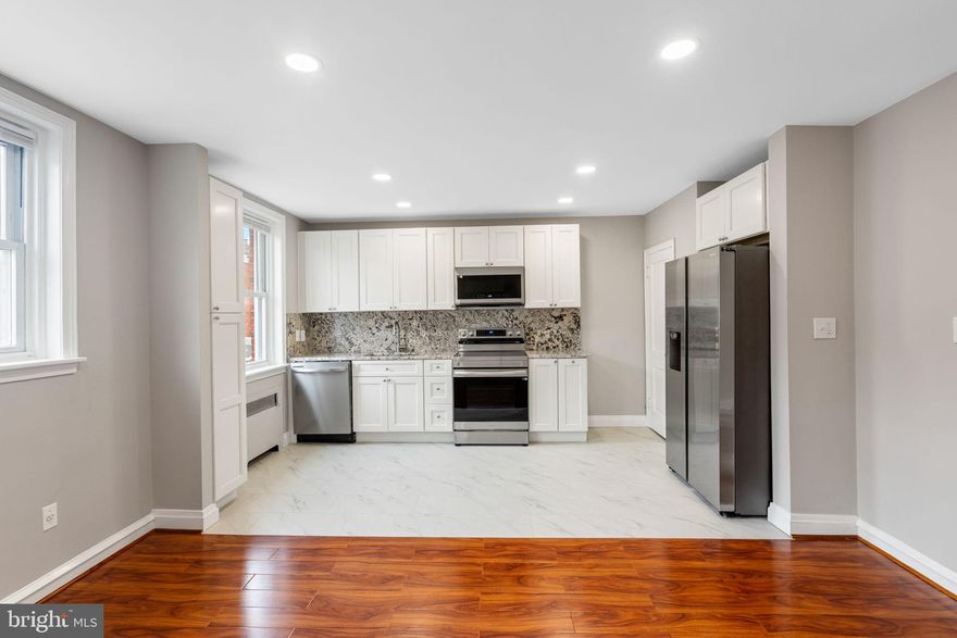 Just bring your toothbrush, move in ready! Fully renovated home with brand new kitchen with all-wood, soft-close Fabuwood cabinets by Cabinets HQ, including pantry cabinets for extra storage with granite countertops and granite backsplash. New stainless steel appliances. Brand new bathroom featuring floor-to-ceiling tile, bypass glass shower doors, new plumbing, toilet, and vanity. Freshly painted throughout. New electrical with recessed lighting. New entrance and storm doors. Gleaming flooring throughout. Renovated closets, including expanded storage in the master bedroom. New garage door. Move-in ready with all major upgrades complete!