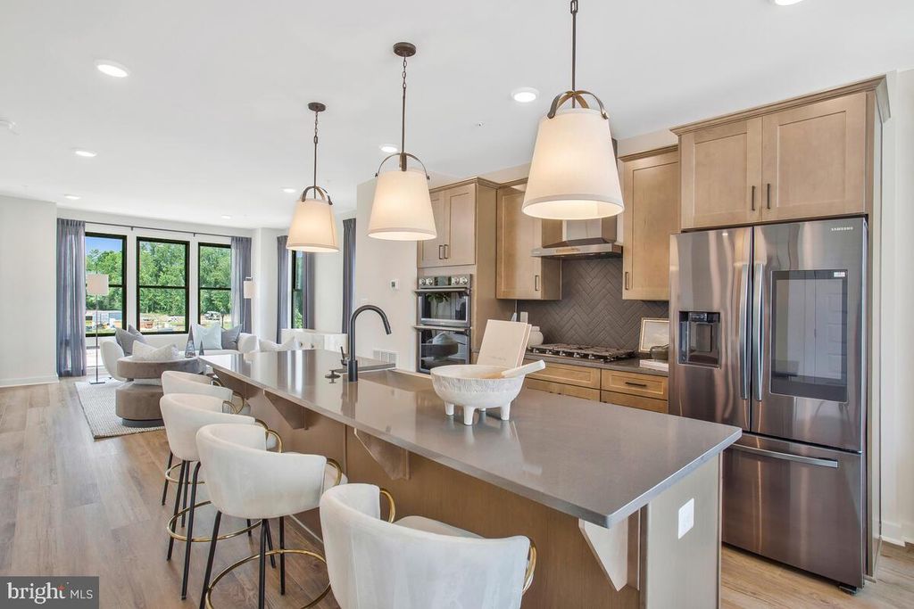 Photo of 5016 Henry King Way #20F, BOWIE, MD 20715 (MLS # MDPG2181128)