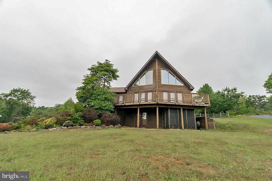 Stunning Chalet-style Contemporary home on 1.44 acres.  Open floor plan features great room, kitchen with separate dining room and 2 bedrooms on the main level.  Upper level master en suite with overlook to the great room.  There are many new features including stainless steel appliance, granite counter tops, new flooring, new HVAC and more!