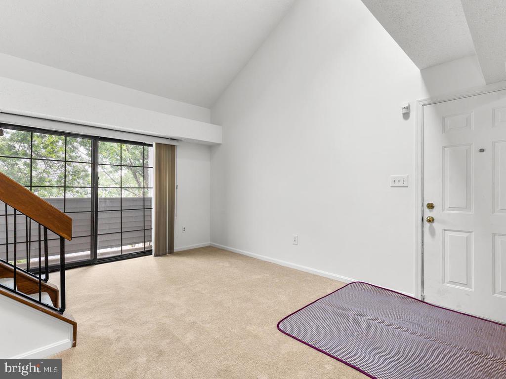 A bright and cozy 2 level/loft Condo on the top floor. 1 bedroom and 1 full bathroom on the 1st floor. Loft and 1 half bathroom on the loft. New HVAC, roof, siding and insulation. Newer Carpet. Two fireplaces. Two balconies. Living room and one bedroom access to the individual balcony. Washer and dryer in the unit. 1 garage included. 1 visitor parking space. Just minutes from FDA, hospital, shops and restaurants
