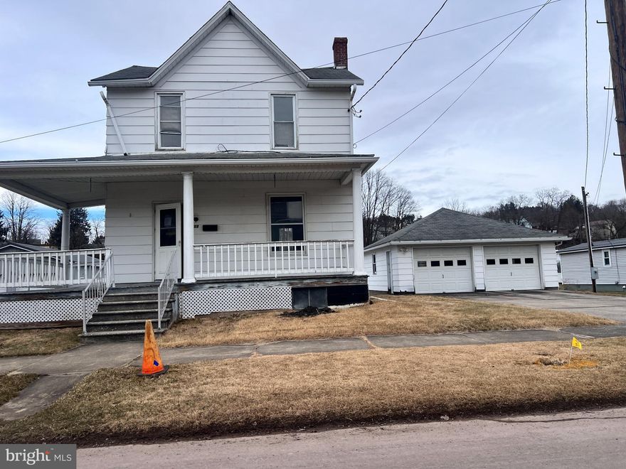 Small town charm ready for your renovations and repairs - Three bedrooms - one bath - Floored attic with fixed stairs - Natural gas hot water heat with radiations (needs repairs and/or replacement)  - Front wrap porch and rear porch - Newer two detached garage (has work shop area and attic with pull down stairs) - Full unfinished basement with interior and exterior entrances - Level lot
Sold as -is