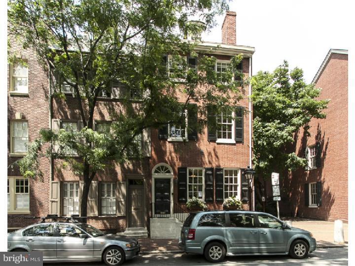 Exquisite 1827 historic corner home. Unique setting on St. Peter's Way w/spectacular views & north, east & south exposures. Located on a beautiful tree-lined street facing St. Peter's Church & gardens. Complete renovation includes 4 bedrooms + study, 5 baths & 5 fireplaces. Lovely black and white marble entry foyer, high ceilings, original details & wood floors t/o, large living room/dining room w/fireplace, large eat-in gourmet kitchen w/Wolf stove w/ double ovens, birch cabinets, granite counters, Subzero refrigerator, Asko dishwasher, pantry, access to 2 level bricked garden w/ fountain. Entry to St. Peter's Walkway leading to 3 Bears Park. Marble powder room & large coat closet. 2nd floor-corner study. Master bedroom suite w/sitting room w/fireplace facing St. Peter's. Beautiful white marble bath w/tub & shower, double sinks & terrace. 3rd floor-2 large bedrooms w/fireplaces & 2 full baths. 4th floor-large cathedral ceilinged bedroom/family room with full bath, fireplace & deck, extensive closets throughout. Large, finished basement with high ceilings, full bath and laundry room. 3 zones HVAC. Parking included at St. Peter's, 3rd & Lombard, in perpetuity/$1,000 per year.