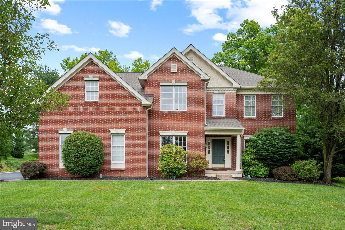 This beautiful 4 bedroom, 3.5 bath home is loaded with extras and upgrades throughout with all the space you could ever wish for! Just wait until you arrive, and you will see the stately brick exterior with front porch, mature landscaping, large driveway, paver patio and privacy plus surrounding this home! You will love the grand entry with a two-story open foyer, hardwood flooring, main floor office/den/playroom, large Living Room and formal Dining Room both with hardwood floors, chair rail and crown molding. You will love the huge open eat-in Kitchen fully-equipped with granite counters, skylight, recessed lighting, double sinks, pantry closet, double oven, refrigerator, built-in microwave, gas range, dishwasher, disposal, center island breakfast bar, open eating area with access to the gorgeous and gigantic new deck (2016) overlooking the private yard! The Family Room is open to the Kitchen with vaulted ceiling, gas fireplace and second staircase to the second level. There is a convenient main floor Powder Room and Laundry Room with new floor, sink and closet with access to the two-car turned garage with electric openers. The second level has a grand Main Bedroom Suite with Retreat Area along with a huge walk-in closet and awesome full bathroom with Jacuzzi tub, ceramic tile, large shower, separate toilet room, double sinks and super spacious! The additional bedrooms are spacious with great closet space, double linen closet and the hall bath has double sinks. The walk out lower level is finished with a brand new luxury vinyl floor, recreation room and exercise area, closet space galore in that you have so much storage space and the best feature is that you have a full bathroom as well! You will love the outside access to the yard from this lower level. Other fine features include: security system, new roof (2015), new Trane gas furnace, outdoor a/c and indoor evaporator coil installed (2024) , new second floor HVAC system, 2 stage gas heater, A/C (2022) and most of the interior has been freshly painted, and the total square footage of this home is 4,657! This location is amazing in that you are close to everything with great restaurants, shopping galore, easy access to Philadelphia, Wilmington, train stations and so much more!