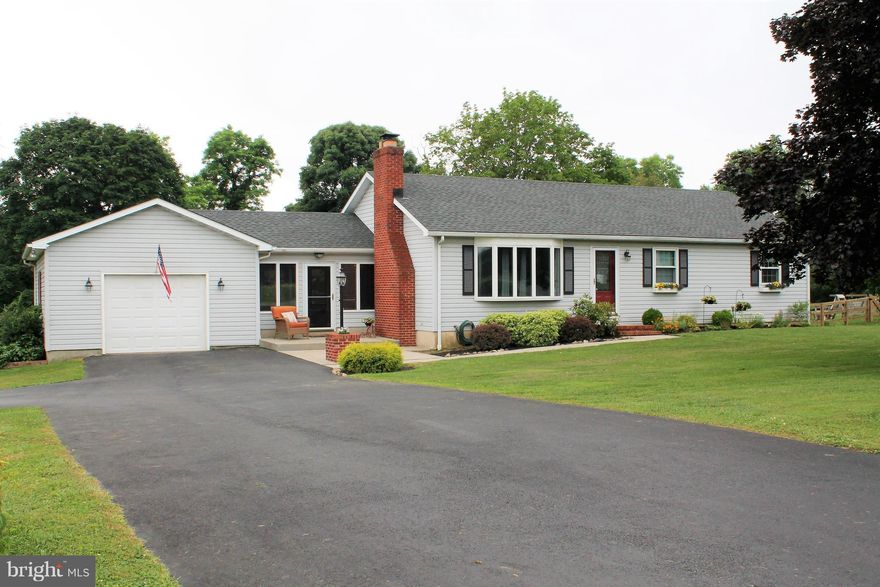 Meticulously maintained Rancher with hardwood floors throughout. Oversized one-car garage & plenty of parking space. Spacious flat lot with almost 3/4 of an acre. IC View Real Time 9 camera system. Huge attic with plenty of storage space. Back patio with retractable awning. Great back yard with shed and playset. This is a must-see!