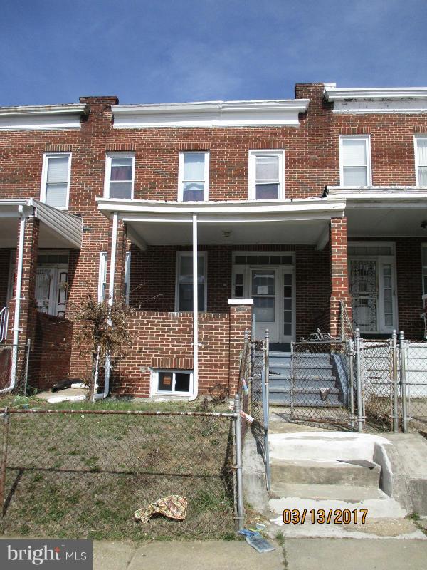 Must see this spacious row-home. Needs mostly minor repairs and updating. Great opportunity in this four bedroom, one bath, middle unit row-home with a separate dining room, front porch and fenced-in yard. Convenient to shopping and close to public bus routes.
