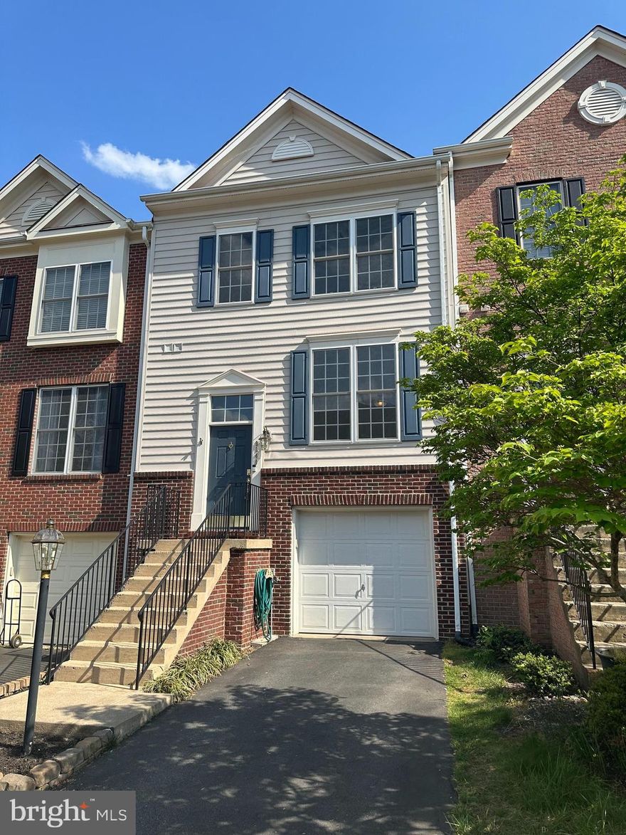 AVAILABLE IMMEDIATELY!  Sought-after location and spacious townhome with excellent location!  Hardwood floors on the entire main level, large living area and separate dining area; kitchen with granite counters, stainless steel appliances, and a sliding glass door leads to deck overlooking common area.   Upper level offers large primary bedroom with en-suite luxury bath with separate soaking tub, shower and double-bowl vanity.   The walk-out lower level offers large recreation room and walks out to large rear yard.   Pets case-by-case basis, no pets over 40lbs.  To apply, copy and paste this link for rent spree:  https://apply.link/HrZOGlc