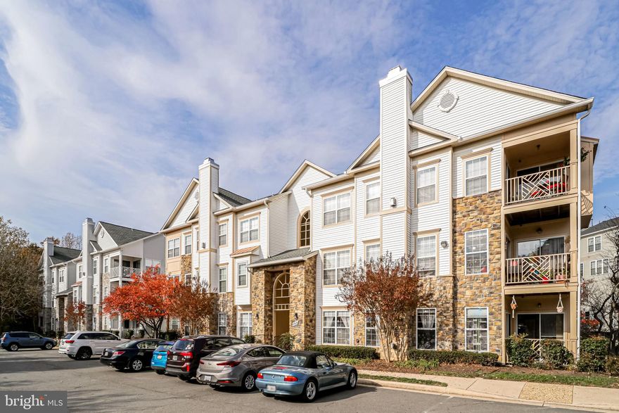 EXCITING NEW OFFERING - Wow!  This light-filled unit with banks of windows OVERLOOKING COMMON AREA features approximately 1,045 square feet of living space boasting 2 bedrooms, 2 updated full baths, expansive living area with gas fireplace, updated galley kitchen, separate dining area, and a lovely private balcony with common area/tree line views.  This unit includes NEWER HARDWOOD FLOORS throughout, designer lighting, window treatments, fantastic closet space, IN UNIT WASHER AND DRYER, and a SEPARATE STORAGE CLOSET (just steps from unit in exterior hallway entering unit - second door on left side).  Prime location just minutes from the Van Dorn Metro, major commuter routes, shops, restaurants, and more.  This is an amenity-rich development with outdoor pool, clubhouse, walking paths, and playgrounds.  RECENT UPDATES: Engineered Hardwood Floors 2018, HVAC System 2017 (w/warranty until May 2022), Kitchen Remodel 2016, Bathrooms Remodel 2016, Washer/Dryer 2010.  Additional: gas range, gas heat, gas water, ample resident and guest parking, main level entrance, rear balcony is 10+  feet above grade, meticulously maintained community.  LOW CONDO FEE of $345 per month. The home is perfect and waiting for you to enjoy!