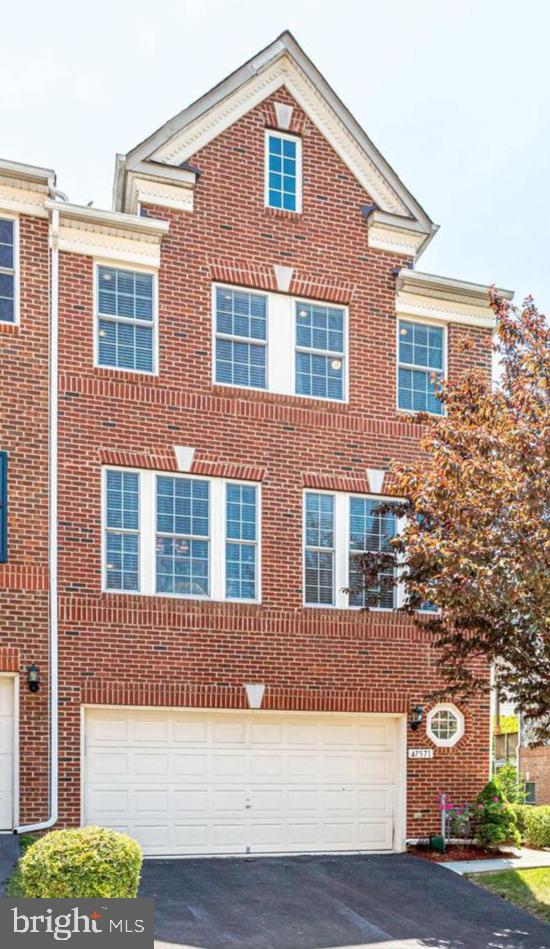 ***AVAILABLE September 15th ***Luxury three level end unit brick townhome with 2 car garage. Recently installed flagstone pathway. There is a half bath and utility/storage on the entry level as well as a walk out to the covered patio. Gourmet kitchen with butler’s pantry, stainless steel appliances and granite counters. Upper level open floor plan with lots of windows both in the family room, breakfast room, living room and dining room. The cozy breakfast area with french doors which open to the first of two covered decks overlooking the back yard. There are hardwood floors throughout all three levels of this well maintained townhome. Laundry on bedroom level. Crown molding, 9" ceiling, Community Center, Exercise room, Golf Course Membership Available, Jog/Walk Path, Party Room, Pool Outdoor, Tennis Courts. Mins to the airport.