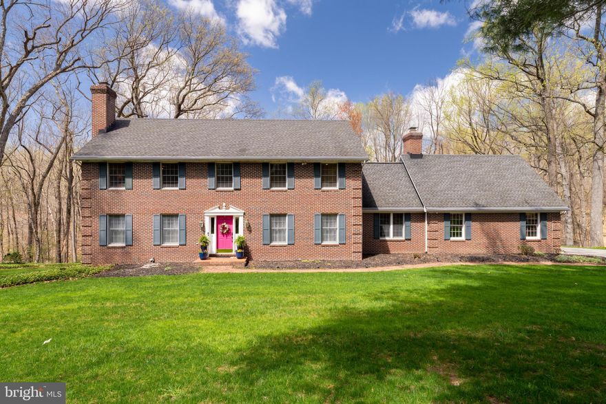 Price Improvement! Welcome to 1206 Somerset Place! Tucked away on 2.3 tranquil, wooded acres in the highly sought-after Falls Road Corridor, this beautifully maintained home offers over 4,200 square feet of serene living space—just minutes from I-83 and 695. Step inside to find elegant wainscoting in the entryway, a formal living room with a cozy fireplace, and a gracious dining room perfect for hosting. At the heart of the home is the expansive kitchen, newly updated with a stunning waterfall quartz island, sleek Bosch induction cooktop, ThinQ LG stainless steel refrigerator, Bosch dishwasher, and a new deep sink with water purifier. A striking glass tile backsplash and rich cherry wood cabinetry complete the space. Just off the kitchen, a stylish butler’s pantry with a wet bar leads to a charming screened-in porch—ideal for outdoor meals and relaxing evenings.  Natural light fills the adjacent family room, which features soaring cathedral ceilings and a wood-burning fireplace. Sliding glass doors from both the kitchen and family room open to a spacious composite deck overlooking the private backyard and wooded landscape. The main level also includes a convenient guest bedroom and full bath, along with a well-appointed laundry and mudroom with access to the attached two-car garage. Upstairs, the spacious primary suite is a true retreat, offering a spa-like bath and an oversized dressing room with extensive built-ins. Two additional bedrooms share a generous hall bath. The finished, walk-out lower level offers even more living space—perfect for entertaining, working out, or hosting guests—with a full bath and abundant storage options. This Baltimore County sanctuary offers an elegant and comfortable living experience you'll be eager to call home.   Showings Starting - Wednesday, April 16th  Open House 1-3pm