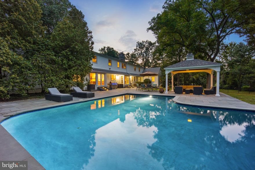 Are you dreaming of a private oasis that’s also close to all the shopping, restaurants & amenities of the Main Line…. including the commuter train?   Want to make sure everyone has room to spread out & have a quiet workspace… but still want a home that is warm & inviting?   Are you hoping this dream home will be move-in ready & thoughtfully updated?  Welcome to 913 Weldon Lane!  Located in the award winning Radnor School District & situated at the end of a premier cul-de-sac, this spectacular home offers it all!  Enter the property through a stately, stone pillared drive and take in the landscaped yard and sylvan vistas.   Step onto the front, covered porch and through the double doors into a dramatic two story ENTRY FOYER, accented w/curved wrought iron railings & pegged oak hardwood floors that extend into the FR, LR, DR and main halls.   To the left is a large paneled FAMILY RM w/built in shelves, woodburning fireplace and  bar.  To the right of the front door is a sunken LIVING RM w/wood burning fireplace & enough space for all the furniture you need.   Down the main hall is the renovated, EAT-IN KITCHEN.   A charming brick fireplace is juxtaposed with sleek Delicatus granite countertops and upscale stainless appliances for today’s modern lifestyle.  You’ll enjoy time spent in this space with the JennAir double ovens and induction cooktop (easily convert to gas if wanted), Kenmore Elite refrigerator/freezer, stainless sink with disposal and brand new Bosch dishwasher.  The abundance of counter space in this kitchen provides ample food prep area as well as two separate breakfast bars for informal dining.  Sliders from the kitchen lead to the back yard and pool area.   The kitchen organically flows to the FORMAL DINING RM, featuring French doors to the dramatic saltwater pool… making this combined space ideal for large holiday gatherings & entertaining.  In the corner of the DR, access to the ATTACHED 2 CAR GARAGE is conveniently positioned.  The DR opens up to the LR to create an easy circular flow to the floorplan.  Down the hall from the kitchen is the LAUNDRY RM with outside access, a utility sink and new front loading LG washer and dryer, both with steam cycles.  Next, is a POWDER RM with pedestal sink.    At the end of the hall is a PRIMARY BR SUITE so large, your king sized bed will seem small in it.   This suite features two big closets and a gorgeous FULL BATH with double sinks, soaking tub and oversized shower.    Completing this level is BR #2, a large space with built in shelves, currently used as an office.   A sink was installed when the owner used this room as her art studio, demonstrating how easy it would be to add a full bath to this room.   On the 2nd level, you’ll be struck by the wide and generous proportion of the landing, which features a READING NOOK.    To the right is BR #3, an oversized space with multiple large closets, including a cedar closet, and a full bath w/tub that also opens to the landing.  Bright and sunny BR #4 could also serve as the perfect homework area, guestroom or 2nd level hang-out space. Down the hall is another large cedar closet.  BR #5, at the end of the hall, is another large room with large closets & its own bath w/stall shower.     This level offers incredible storage in not only the closets but additional attic space.   The PARTIALLY FINISHED BASEMENT provides even more living space, perfect for a home gym or game room.   In the back of the property is an inviting, heated & recently resurfaced SALTWATER POOL.  This is surrounded by a stunning stone patio complete with cabana style gazebo.   The property is surrounded by land that will not be developed, assuring your privacy for years to come.   ADDITIONAL UPGRADES INCLUDE:  NEW ENERGY EFFICIENT WINDOWS, NEW WATER HEATER, GAS CONVERSION (2018) W/UPDATED HVAC, UPDATED ELECTRICAL & HOOK UP FOR A GENERATOR, LIGHTED STONE PILLARS AT TOP OF DRIVEWAY, RECENTLY RECAPPED & RELINED CHIMNEYS.