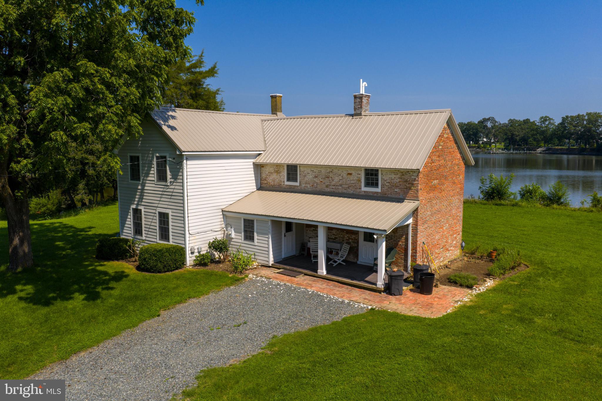 Welcome to Presquile Haven — A Historic Waterfront Gem in Easton
Experience the unmatched charm of this beautifully restored, fully furnished retreat at 26692 Presquile Rd., Easton, MD. Nestled along the serene East Wye River, Presquile Haven offers breathtaking water views, a brand-new dock, and an atmosphere of total tranquility—perfect for kayaking, fishing, or simply relaxing in nature. This 3-bedroom, 1.5-bath home features a Jack & Jill bathroom, spacious living and family rooms, a formal dining area, and a well-equipped kitchen, all freshly painted and thoughtfully designed for comfort. Enjoy your morning coffee on the porch or entertain on the back deck as you take in the peaceful surroundings. With water and WiFi included, a new washer/dryer, and no pets allowed, this fully furnished home is available for $3,500/month plus security deposit—a rare opportunity for anyone seeking a truly serene waterfront lifestyle. Check out the video tour via YouTube.