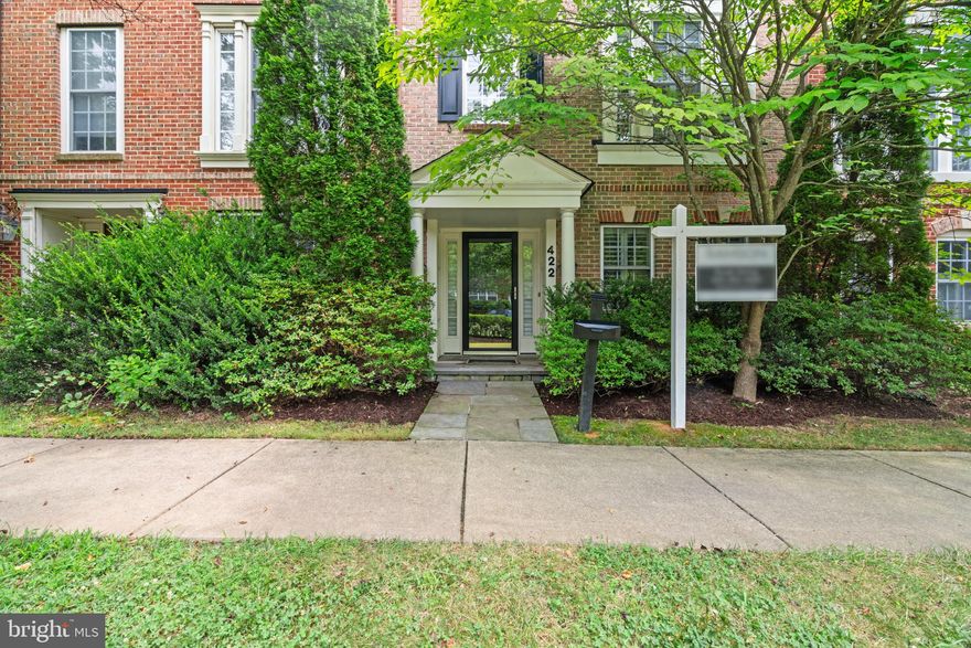 Gorgeous 3-bedroom 3.5 bath brick-front townhouse in highly sought after Lakelands community.  Recent updates in this very gently used house include new heating system (2021), air-conditioning unit (2021), and new refrigerator (2022). Welcome to an open living-dining area with white kitchen cabinets, granite counter tops with a huge island, and resurfaced gleaming hardwood floor, that will win over the most discerning buyer.  Large Trex deck overlooking the patio with sitting area brings a touch of privacy to your own open area. Brand new hardwood staircase installed throughout all three levels add a touch of class and longevity.  Neutral, freshly painted inviting townhouse is ready for your family.   Entry level has ceramic tiled floor, a family room with gas fireplace, a library/office that can be used as a bedroom, full bathroom, and laundry with extra shelves.  Upper level has master bedroom suite, double vanity master bathroom and two walk-in closets.  This level completes with two additional sunny bedrooms and another full bath. Main two levels and the MBR have plantation shutters. Crown molding, wainscoting, wide hardwood staircase, transoms, Palladian windows are some of the distinguished features of this townhouse. All the three levels are above ground with a two-car over-sized garage with shelves, a lovely quite patio and a large deck. Enjoy the community amenities of serene lakes, walking and jogging trails, basketball and tennis courts, community pools and playgrounds. Located walking distance to Kentland Shopping Center with shops, restaurants, cinema halls, various services and boutique stores, it is a true pleasure to live in this upscale townhouse in the popular Lakelands/Kentland community.   Please submit your offer by 7/23, 5:00 PM.