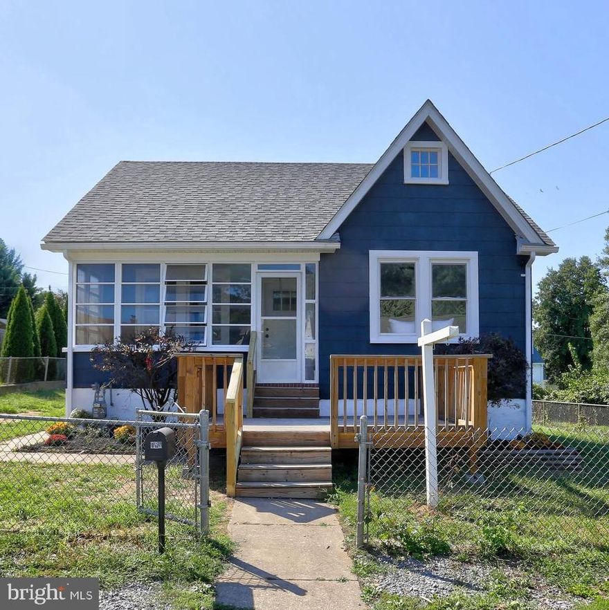Discover the charm of this beautifully renovated Cape Cod home that exudes warmth and character. Begin your journey through this home with an inviting sunroom/mudroom entry featuring a stunning hardwood ceiling, setting the tone for the delightful surprises inside. The sunlit-filled living room offers a cozy retreat, perfect for relaxation and entertainment. The kitchen is a culinary dream with fresh white cabinets, stainless steel appliances, and exquisite granite countertops, blending functionality and style seamlessly. Enjoy the sleek and modern design of neutral LVP (Luxury Vinyl Plank) flooring and plush carpeting throughout the home, ensuring both comfort and durability. The upper level boasts a spacious primary suite with a charming full bath and a private interior/exterior entrance, offering a perfect retreat. Explore the possibilities with the potential studio apartment, providing flexibility for various living arrangements. Two additional bedrooms on the main level provide ample space, while a full bath ensures convenience and comfort. The lower level offers a versatile rec room and a 4th bedroom, making it a fantastic space for relaxation, recreation, or guests.
The large utility area provides plenty of storage space, keeping your home organized and clutter-free.
Choose between the front porch or rear composite deck with an awning to enjoy your evenings, both offering the perfect backdrop for outdoor relaxation. The fully fenced yard includes a shed, a potential chicken coop, and a bonus gardening shed, making it a haven for gardening enthusiasts. Open House Sunday 11:30 to 2:30