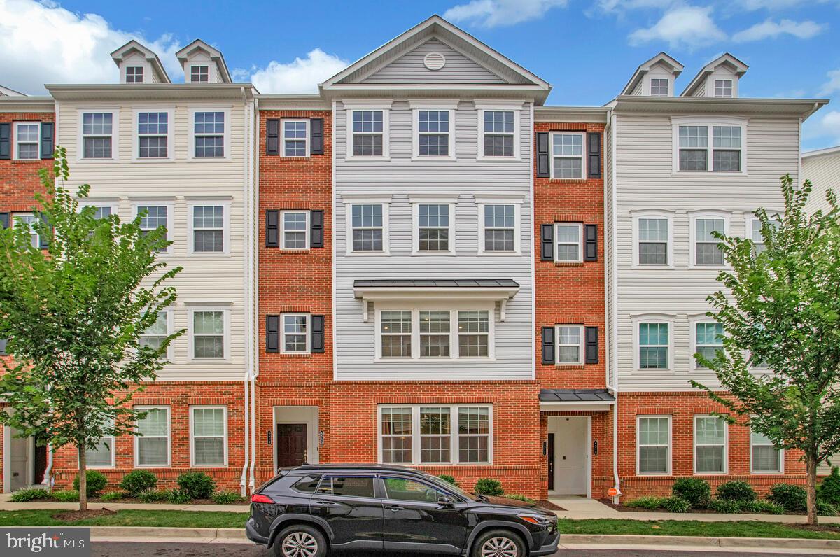 This beautiful 2022 condo feels brand new and offers the perfect blend of modern style and convenience. This is a unique two-level unit with a private one-car garage. The main level features an open floor plan, ideal for entertaining, and includes a convenient half bath. Upstairs, you'll find a second living space that opens to a private balcony, perfect for relaxing. The spacious primary bedroom boasts a walk-in closet with a custom closet system, providing ample storage. Water, sewer, access to the community pool, fitness center, and amenities center are all included with the rent.