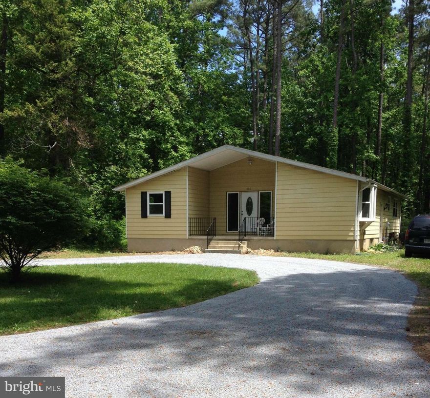 Enjoy this beautiful 4 BR, 2 BA Ranch Style 1632 sq ft home with a large Living Room, Updated Kitchen and BAs.  New roof, windows, bamboo flooring and HVACs. Must see the additional 1,020 sq ft in the basement featuring a large Entertainment area, workshop and loads of space in the laundry room.   Great wildlife activity and room to play on this almost .5 acre lot. Lead Free!  MUST SEE!