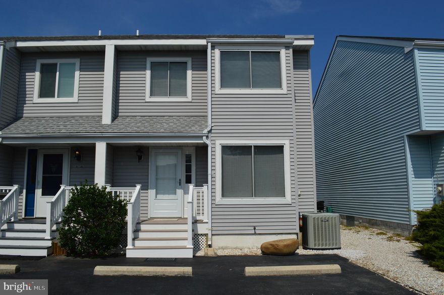Welcome to your Ocean City vacation dream home.  This 3 bedroom, 2.5 bathroom town home HAS NO CONDO OR HOA FEES, which  makes this home even more affordable!  This well kept unit has never been rented and comes completely furnished.  2 BOAT SLIPS ARE INCLUDED!! There is a brand new entrance with trex deck & stairs,  vinyl railing and storm door. New paint on 1st floor, staircase and second floor foyer.  The roof was replaced in 2015+/-. Keep cozy with a wood burning fireplace in the winter.  There is a wet bar in the living room.  Entertain in the summer on the rear deck that has a retractable awning and a great view of the canal.  It only takes a minute or two to motor out of the canal to Isle of Wight Bay and all the recreational options you can imagine. There is plenty of off-street parking (4 + spaces) and it is blacktop.  Great for year round living, summer getaway  or rental opportunities