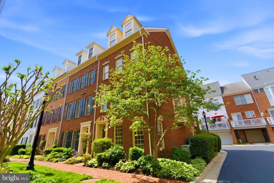 Exquisite End unit townhome in the heart of Old Town Village. This four level three-bedroom three-and one-half bath residence offers the ultimate in convenience to the heart of Old Town Alexandria, in a contained community with all imaginable amenities. Luxury abounds in this pristine, completely updated and rarely available Fayette Model. Nine-foot ceilings make the spaces open and airy, flooded in natural light. The entrance leads to a tiled foyer, and a ground floor den or office with built-in bar and electric insert fireplace. The hallway leads to the two-car attached garage.  Step up to the main living space, with generous living room, dining area and completely new and updated kitchen, hardwood floors, built-in shelving and a gas insert fireplace complete the space as you are surrounded by floor to ceiling windows.  The kitchen redesign is a chef’s dream. Shaker white cabinetry, stainless appliances, brand new quartz counters, and a newly installed counter height island and brand new, custom built-in wine and coffee station provide generous storage options and the ultimate in configuration options. The dining room features a custom bay window. The kitchen also is your access point to the spacious rear deck shrouded with a colorful garden contained in flower boxes and shaded by the custom automated Sunsetter awning.

The second floor hosts the primary suite, featuring a cathedral ceiling, walk-in closets with custom closet organizational systems, and a completely new remastered ensuite spa bathroom. Double vanities, oversized spa shower with seating and custom marble niche, spacious linen/toiletries closet and tasteful tile choices make the space timeless and elegant. A second bedroom with walk-in closet and renovated full bath, equally tastefully remastered, finishes this stage of the home. The hall laundry room with full-size washer and dryer, shelving and hanging space complete the space. The third level is a massive loft space, great for guests, a play space or a quiet respite for reading or an additional office. Newly renovated, ensuite full bath rounds the amenities.

Four ceiling fans with remotes, and custom built in plantation shutters give the space Charleston charm. Dual heating and cooling units make the space comfortable in any season.  Abundant crown molding, and freshly painted throughout, makes the space sparkle.

The community offers a community roundhouse featuring a well-stocked gym and work out center, a community room that can be rented for parties and an amazing salt water pool.

Over $200K in improvements including: new Roof (2024), Kitchen renovation (2026), all bathrooms renovated (2026) HVAC Replacement (2023 and 2018), plantation shutters, replaced hardwoods throughout and completely repainted to include surfacing of the garage floor (2026).

Less than 1 mile to the King Street Metro and VRE Train Station and walkable to Whole foods and a slew of restaurants,  this residence places you a short stroll to the abundant vibrancy of Old Town Alexandria. Do not hesitate.
The sellers have set an offer deadline for any and all offers by Noon on Tuesday May 5, 2026.