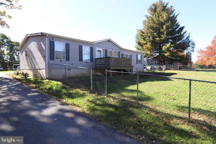 Spacious 3-Bedroom Manufactured Home on a foundation on 1 Acre with 7 Outbuildings – Unrestricted Property!
Welcome to your dream property! This extra-large manufactured home on a permanent foundation sits on 1 unrestricted acre, offering endless possibilities. Whether you're looking for a homestead, a place to run a small business, or space for hobbies and projects, this property has it all!  Close to Inwood and everything it has to offer and only minutes from the Virginia line, don't miss your chance to own at this price.