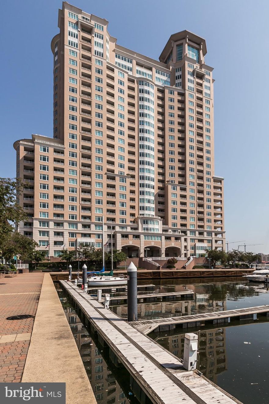 SUNLIT LUXURY APARTMENT with GREAT VIEWS ready for immediate occupancy! Highlights include spacious LR/DR area walks out to large covered balcony for year-round dining, eat-in kitchen offers new quartz countertop, 2nd balcony, lots of pantry/cupboard space. MBR bay window opens to Domino sign and Fort McHenry views and offers beautiful sunrise. MBR walk-in closet, large bath with oversized whirlpool tub, stall shower, marble accents. Full size W/D, and secured garage parking with assigned space included. Plenty of guest parking and additional spaces available to rent. Full service luxury building with array of building amenities! 24/7 concierge with valet parking, extensive fitness center, steam/sauna, pools, business ctr, billiards, guest suites, lounge, grill and picnic area! Beautifully landscaped grounds with onsite restaurants, gourmet deli, walking/jogging paths, and 24/7 security staff! Excellent location close to shopping, nightlife, restaurants, stadiums, MARC train, and only 9 miles to BWI Airport! Available NOW!