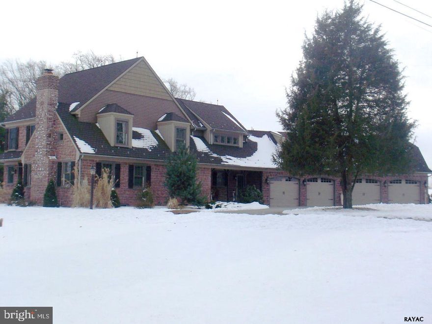 Stunning French Chalet on a corner lot offering quality and detailed craftsmanship!  Home boasts stone front, granite tops in amazing kitchen with breakfast bar, wood FP in FR, hickory HW floors, 4 car oversized garage and more!  MBR has MBA w/doorless slate tile shower w/glass wall and separate soaking tub! Built by builder FOR builder! So much to enjoy!