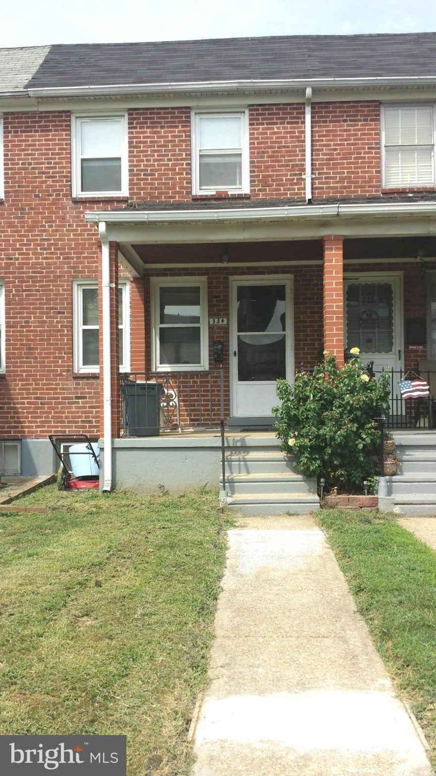 Welcome home to this clean and move in ready 2 bedroom 1.5 bath home. This brick town home features a front porch, 2 car paved parking pad in rear, beautiful hardwood floors throughout, generous room sizes, attached shed outback, and plenty of storage. Perfect for a first time buyer or for adding to your rental investment portfolio.