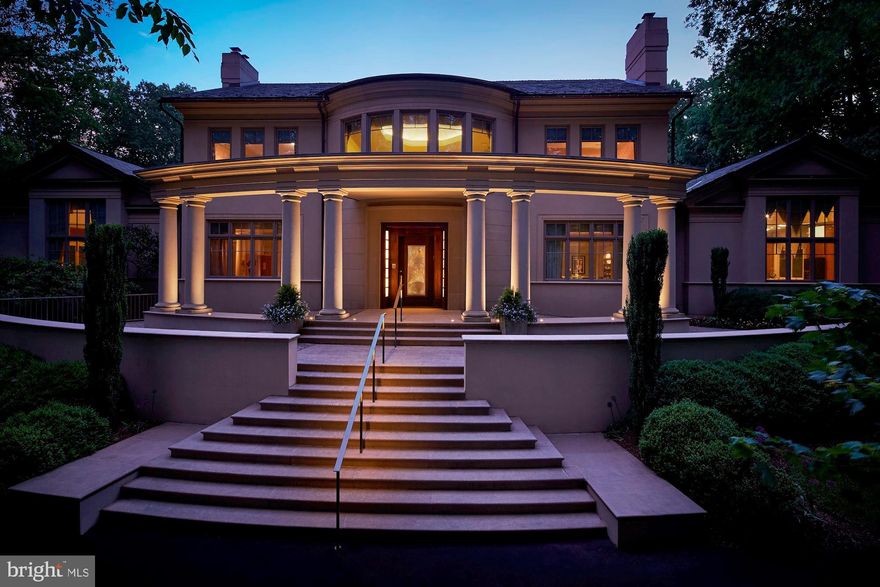 One of a kind property you don't want to miss in the prestigious Fairfax Station estate community of Dominion Valley Hunt.  Award-winning construction with the finest finishes throughout by Monarc Construction, "Woodley House" is a 15,000+ square foot executive mansion that you must see to believe. Set atop a hill on five private acres of majestic wooded grounds, this showcase home was built for entertaining.  With its natural flow and true catering kitchen, it can easily accommodate seated dinners for 26 and cocktails for hundreds.  Yet the main level also offers a private and comfortable oasis, including an owners' wing of 3,700+ sq ft featuring a large distinctive bedroom and foyer, two room-sized dressing rooms, a luxurious spa, large private laundry room, a home theater and two large working offices, making it the perfect place to work from home and to relax.  It's so beautiful you'll never want to leave, but when you do the community has direct access to Route 123 and easy access to the Fairfax County Parkway and I-95/395/495. A grand two-story foyer, parlor, living room, dining room and two-story mahogany library punctuate the thoughtfulness of the home's design.  Three luxurious bedrooms with en-suite baths are on the second floor. Family/game rooms and a second kitchen complete the walk-out lower level. Commercial-grade HVAC pumps fresh air into the home 24/7. Smart home technology and green home building were incorporated into the construction. A 1,000 sq. ft enclosed courtyard and a circular drive that connects two grand street entrances from two different sides (parking for approximately 50 cars) complete this exceptional property. Every detail is designed to be low-maintenance. This is the premier Art Deco residence in the Washington metropolitan area, with many vintage and custom-built furnishings.  Purchasing the home furnished is an option, please call listing agent for details.