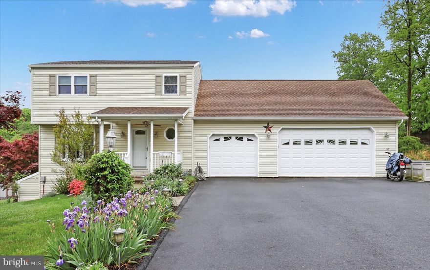 Incredible Valley Green home with new kitchen, new deck, newer roof, finished lower level, and 3 car garage! The fantastic floorplan includes a living room with french doors to the deck and a spacious dining room large enough for hosting family gatherings. The newly remodeled kitchen (2021) is beautiful and functional with shaker style cabinetry, quartz countertops, stainless steel appliances (double oven!), custom plate rack, farmhouse sink, and updated flooring. 3 bedrooms full of natural light and full bath on the 2nd floor. Head downstairs to the family room with second kitchen/bar with plumbing, microwave, fridge, and curved countertop perfect for stools. Additional full bath in the lower level makes this space even better. Coal or wood stove provides extra heat. Step outside to experience exceptional outdoor living on the new deck (2023) with privacy panels or the patio below. The yard is lush and level with established landscaping, and the shed provides even more storage. A 3 car garage in this price range is a luxury you will be happy to have! Newer roof (2018), windows (2014), doors show pride of ownership, and superb location make this home one to not miss!