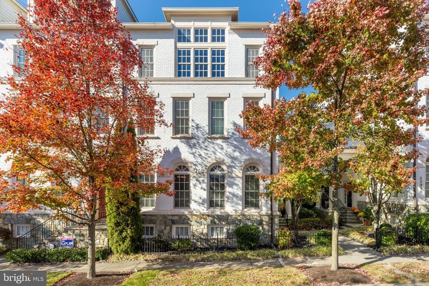 Beautifully maintained, Mitchell and Best designed popular Windsor Model end unit townhome in the most desirable and sought after Maple Lawn. The stately townhome with the feel of a detached home is larger than some of the single homes with 5,000 sq ft of luxurious living space. This home features majestic pillars on the front porch, open floor plan, 9+ft ceilings throughout the home. The entrance to the unit is a dramatic foyer facing the dining room located in the center of the home. To the left of the dining room is a spacious Living Room, to the right is the beautiful Kitchen with Quartz counter tops, new stainless steel Refrigerator, Dishwasher, Range hood, new Sink and Faucet, Large Island for extra work space in kitchen, Family Room with custom built-ins and fireplace. A large Breakfast area with tray ceiling opens to a lovely Stone Patio for cook-out. On the second level is a master bedroom with luxury bath and amazingly large walk-in closet with new wardrobe system and a generously sized second bedroom with attached bathroom and large walk-in closet. Laundry room is conveniently located on the second floor and has a new closet. The third level has a large bedroom with attached bath and a huge sun filled Billiard room. A completely finished basement has a second family room and a kitchenette on one side and an in-law suite or Den with full bath on the other side. Palladian windows protected by 3M Solar film that blocks heat provide breathtaking views of the lush green space, the community center, gym, swimming pool, playgrounds and more. This home comes with Tesla Solar Panels on roof that are maintained by Tesla. Close proximity to routes MD-216, MD-29, MD-32 and I- 95 provides easy access to all surrounding areas.