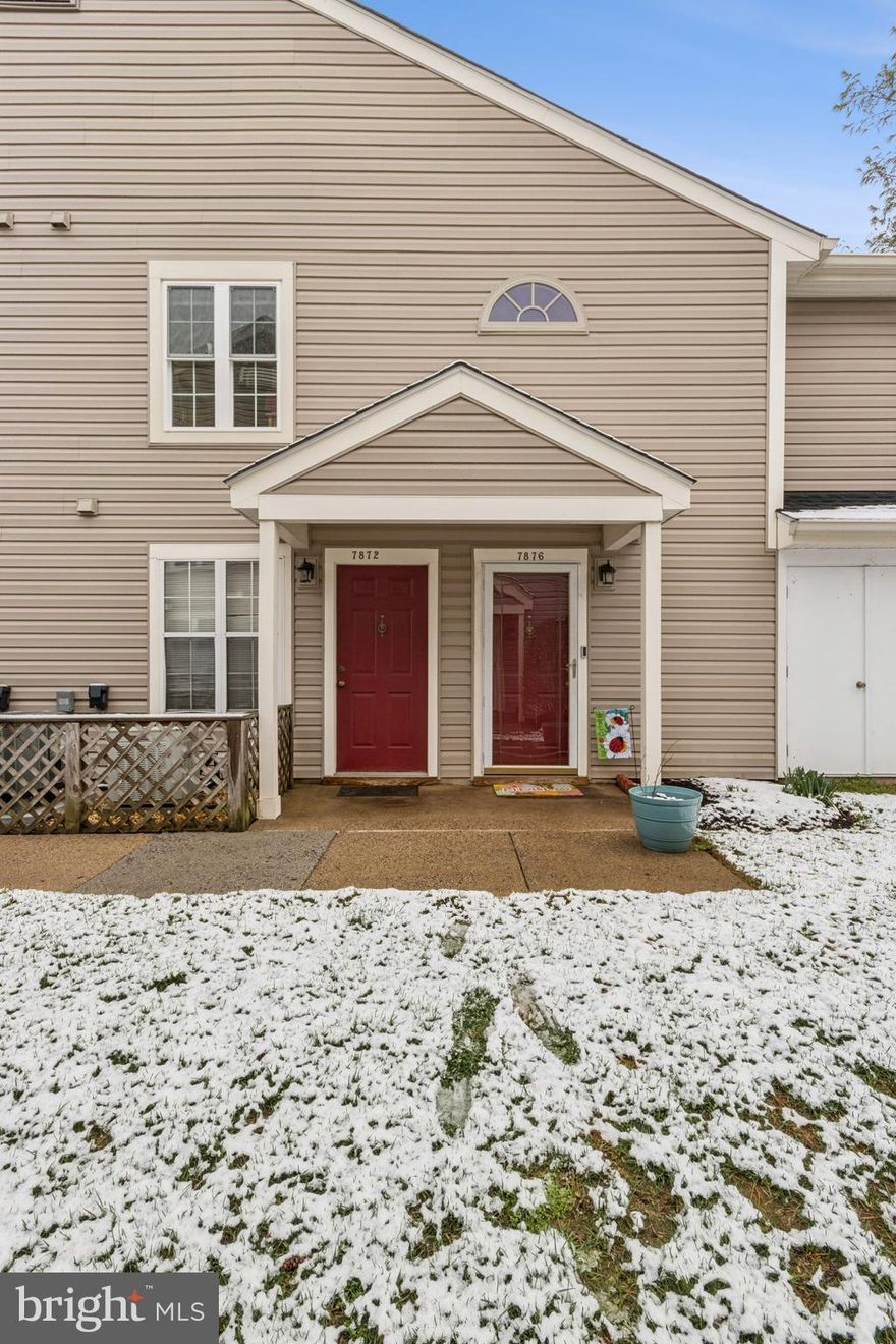 Welcome to this light-filled 2BR/2BA condo offering the perfect blend of comfort and updates. As you enter the home, a practical foyer provides space for shoes, coats, and pet essentials before heading upstairs to the main living area. Freshly painted with a bright, open layout, the home features a seamless flow between the living and dining areas, perfect for gathering and entertaining. You’ll find two generously sized bedrooms, including a primary suite with a private bath. Right off the living area a private deck awaits, backing to trees providing you a peaceful, secluded retreat. Recent improvements include newer windows (2.5 years), plus a new roof and siding (2025). Stylish new bathroom flooring adds a fresh feel.  Located directly across from the Gainesville Promenade, you’ll love the convenience of restaurants, shopping, movies and more. Close to major commuter routes and I66.  Welcome home!