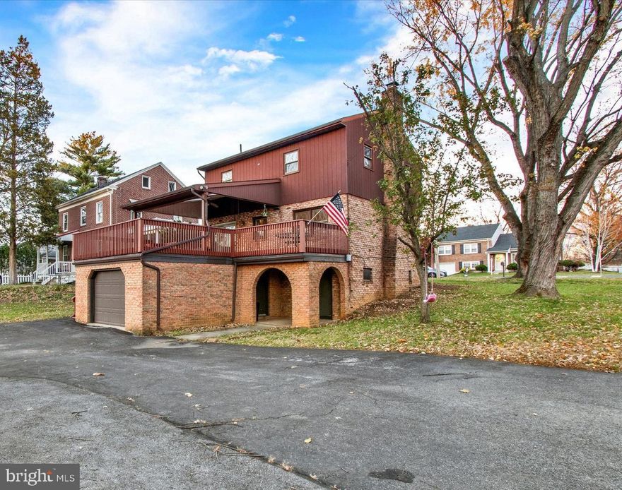 Open house 1/17 POSTPONED due to weather.  Unique Tudor home with garage, finished basement and deck.  Enjoy your deep, oversized corner lot which extends all the way to the street behind it.   New flooring throughout the house.  Two sheds.  Large driveway for several cars plus a garage.  Deck is double the size of the average deck with kitchen walking out to it, plus new deck board and steps.  Inside you'll enjoy an expansive finished lower level with walkout to a patio and the backyard.  Bonus second full bathroom compliments the updated basement.  Three bedrooms on the upper level with full bath and unique woodworking tones reminiscent of early last century tudor home architecture.  Close to 24 hr. grocery and route 61, but peaceful location in a quaint Muhlenberg neighborhood.