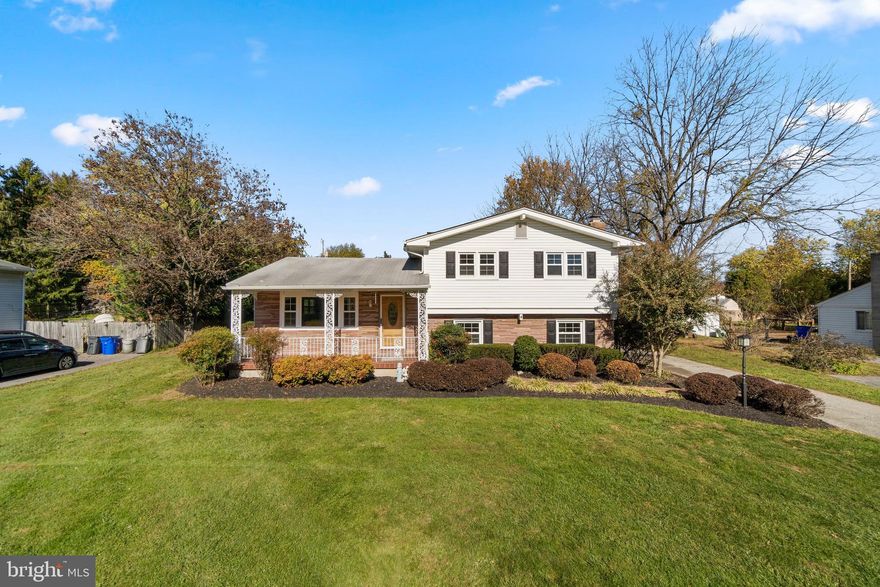 Move-in ready split level home in Brinkleigh offers totally updated interiors, a covered brick front porch, refinished hardwoods, fresh paint throughout, new light fixtures, a living room enhanced by a picture window, and a formal dining room ideal for holiday dinners with a walkout to the tiered patio. Renovated kitchen boasts new cabinetry, new quartz counters, a new dishwasher, and a corner place for a breakfast table. Downstairs you arrive in the family room with new carpet, a stone fireplace with a raised hearth, an updated half bath, a bedroom, and a laundry room with an extra freezer and walkout access to the brand new patio, huge backyard, and storage shed. Three bedrooms are on the upper level including an owner's bedroom with gorgeous hardwoods, and an upgraded hall bath showing a double vanity and new lighting.  Great location close commuter routes, shopping, dining, entertainment, and more!