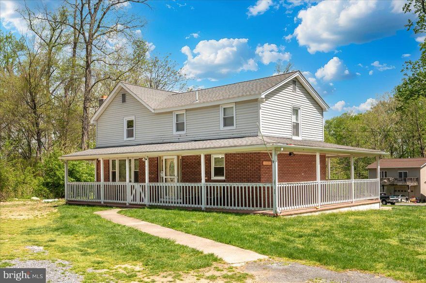 Welcome to this charming colonial home set on nearly an acre. Featuring 3 bedrooms and 1 full bath, a spacious kitchen, complete with an oversized island, granite countertops, and stainless steel appliances. It flows seamlessly into the living room, creating an ideal space for everyday living and entertaining. A convenient main-level laundry and mudroom. . Step outside to enjoy the inviting wraparound porch, perfect for relaxing and taking in the peaceful surroundings. Large yard iwith al stream running through the property and a storage shed for added utility. Many updates were completed in 2017, and the garage has already been started—ready for your finishing touches to make it your own.