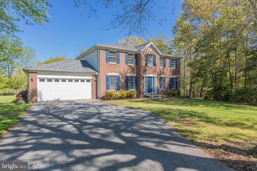 Beautiful Colonial in Chapel Point Woods on 2.37 acre corner lot! Large kitchen with granite counter tops, island with cooktop, double ovens and breakfast nook with garden window for growing spices and veggies. Spacious traditional floor plan offers a separate living room, dining room and family room with wood burning fireplace and sliding glass doors leading out to the deck. Master bedroom with walk-in closet.  Master bath with ceramic tile floors, skylight and separate dressing/makeup vanity area. Convenient upper level laundry. Newer roof (Jan 2018). This home qualifies for 100% financing through USDA (if eligible).