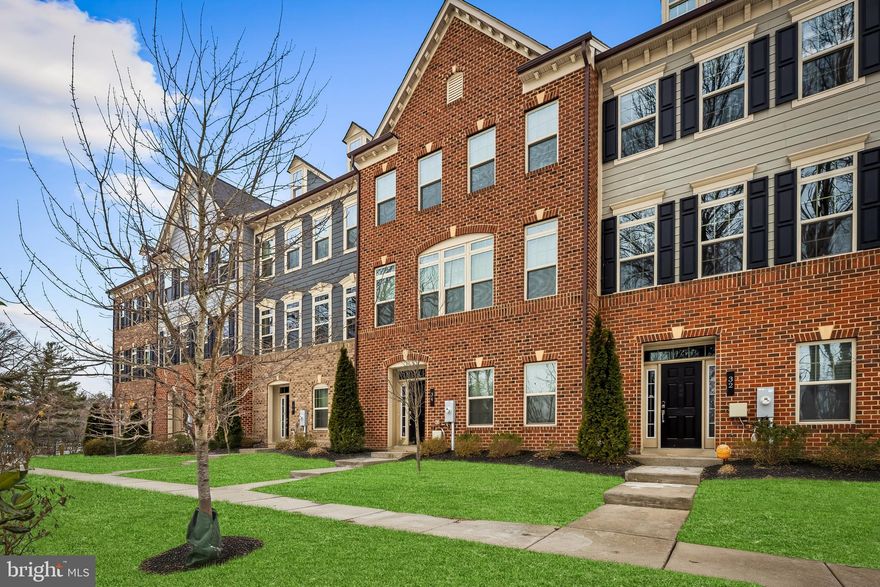 Trust your instincts. Searching for a turn-key home and the opportunity to simplify in real style? Hoping for a desirable main level bedroom and bath also providing flexibility for remote work or workouts? This stunning move-in ready 4-bedroom, 3.5 bath luxury townhouse offers nearly 3,000 sq ft, light-filled rooms with 9 ft ceilings, clean lines, sophisticated neutral pallet, open flow, and gallery walls for collections. Central to the spacious living and dining rooms is the well-appointed gourmet kitchen with expansive 15-foot island with breakfast bar seating for 4 or 5, gas cooking, and a large walk-in pantry. Entertain effortlessly on the spacious Trex deck and enjoy early sunset dining beneath the new retractable awning with LED lighting. Ascend to the gracious primary suite with large walk-in closet and luxurious white bath featuring deluxe nickel fixtures, double sinks, quartz counters, separate water closet, a grand soaking tub plus large walk-in shower with custom glass doors. The opposing wing features a convenient laundry, two additional bedrooms and a shared full bath also with nickel fixtures. HVAC improvements include the addition of climate control zoning, and installation of both UV lighting and humidification. Plumbing upgrades include, new water softener, and water pressure pump. A true oversized 2-car garage with two additional rear parking spaces. This 36-unit community complex provides water, offers mowing, grounds maintenance, plowing, a security gate and walking paths with views to golf course. Convenient to popular restaurants and thriving retail shopping centers. Quick commuter access to I-695, and the best of Baltimore on the harbor.