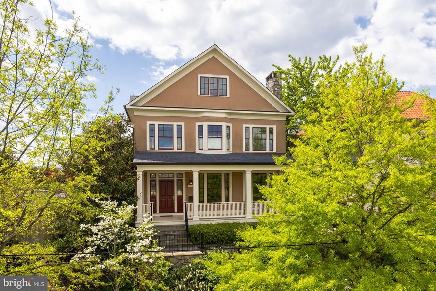 Spacious and rarely available recently built home in DREAM Cleveland Park location backing to the Rosedale Conservancy and steps to multiple schools and Cathedral Commons! Featuring grand-scale rooms, tall ceilings, and spectacular southern light throughout and with dramatic Cathedral and Monument views from its large backyard and multiple porches. Main level features elegant foyer, living room with fireplace, large dining room, and large open kitchen/family room with fireplace, mud room, and screened porch. Upstairs is a large owner suite with 2 dressing rooms, luxurious bath, and private balcony, plus four additional bedrooms, three additional bathrooms, 3rd floor loft with porch, and laundry room. Finished lower level with 9'4" ceilings features large family room, additional bedroom/bath, storage, and garage with dumbwaiter to mud room. Private, flat back yard with patio, screened porch, and shared tennis court!