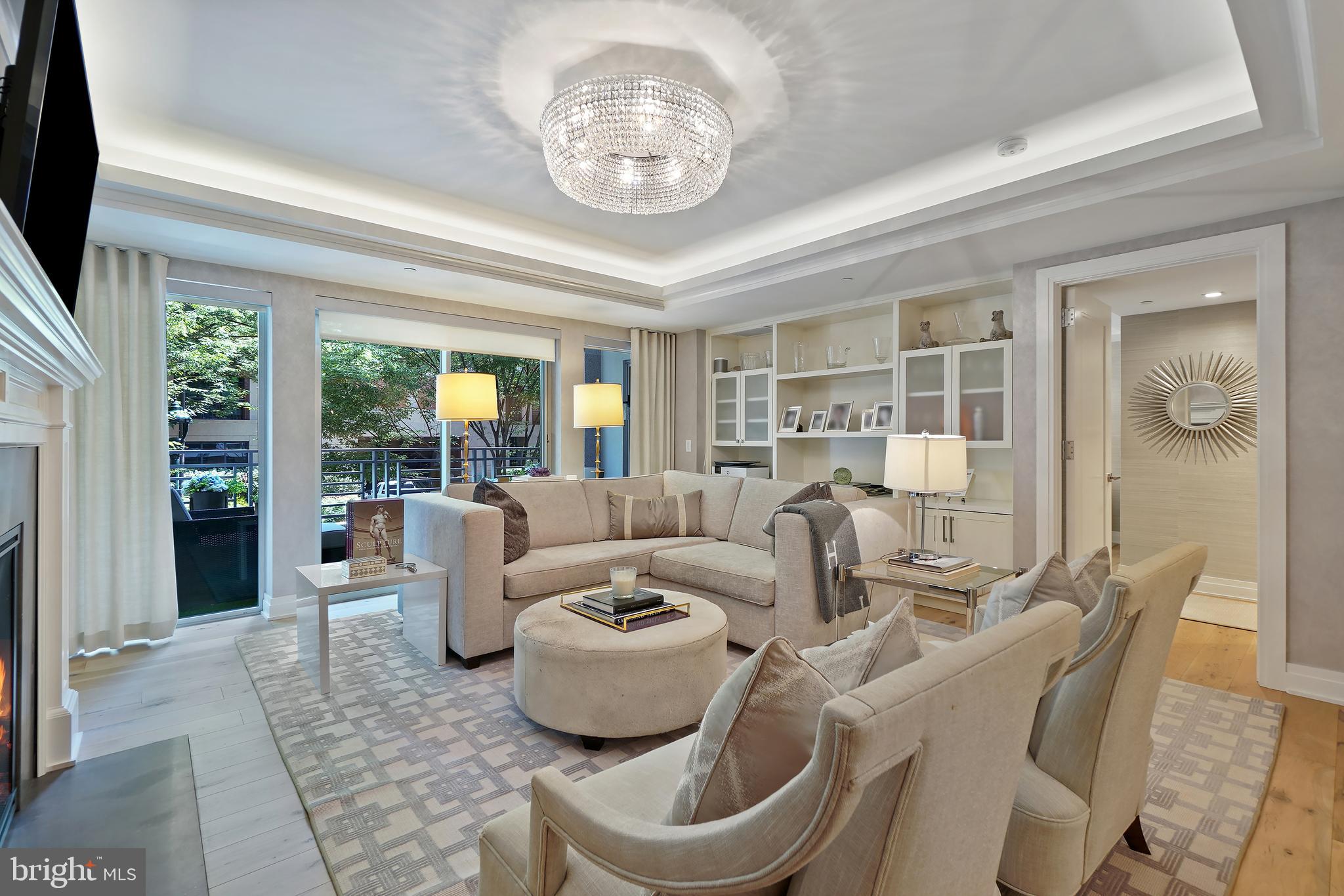 Welcome to Downtown Bethesda's most desired address- The Lauren! This is a stunning one bedroom and den! Take in the beautiful, high-level finishes throughout. From your sleek kitchen, to the cozy living room, venture out onto your private terrace and plant yourself into one of your chaise lounges. The owner's suite is large, complete with a walk-in closet, two additional closets and a wall of built-ins. The owner's bathroom has two sinks, separate shower, separate soaking tub and a makeup vanity with mirror. The den/2nd bedroom/office has a wall of built-ins for great storage. There is a large half-bath, and a separate laundry room with sink. Top of the line appliances throughout. The Lauren has 24/7 concierge service, a state-of --the-art fitness center, an incredible rooftop, and a gorgeous private lounge in the lower level. At The Lauren you are steps away from endless restaurants, stores, pharmacies, grocery stores, parks, the Red Line Metro- the list goes on. Call Stacey Kohl at The Jane Fairweather Team for more information!