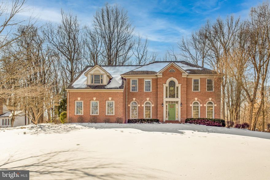 Welcome to this exceptional 4-bedroom, 4.5-bath estate offering nearly 5,900 square feet space on almost one acre in the sought after Tall Oaks Neighborhood. The home features a bright, airy layout with beautiful sight-lines from the upper level overlooking the living room and main hallway, allowing natural light to flow throughout.
The gourmet kitchen with breakfast area provides an inviting space for casual dining and daily living, while remaining distinct from the main living room, offering both functionality and separation for entertaining. Just off the kitchen, step out onto a deck overlooking the flat, usable backyard, creating the perfect setting for outdoor dining, relaxing, and entertaining.
The expansive level backyard offers endless possibilities—ideal for gatherings, play, gardening, or simply enjoying the outdoors in a peaceful setting.
The luxurious primary suite serves as a private retreat, featuring a spacious bedroom, dedicated seating area, and a newly remodeled spa-inspired primary bathroom (2026).
The fully finished basement is an entertainer’s dream, complete with a wine tasting room, full-size bar, and flexible living space with potential for an in-law suite—ideal for guests or multigenerational living.
Recent upgrades include fresh paint in the dining room, office, and basement (2026), new powder room vanity (2026), septic drainage fields replaced (2022), full HVAC replacement with conversion to electric heat (2022), roof replacement (2018), and garage door opener replacement (2025).
 Conveniently located in Southern Anne Arundel County, enjoy easy access to local marinas, shopping, and commuter routes. A rare opportunity to own a spacious, well-maintained home offering elegance, comfort, and versatile indoor-outdoor living in a serene setting.