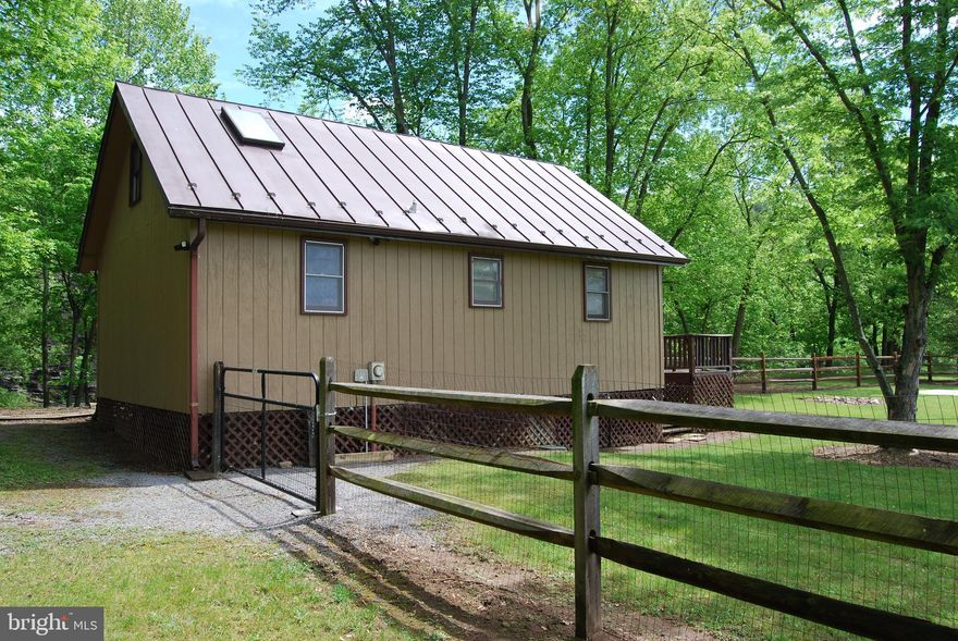 River Front Paradise. This beautiful property offers something for everyone. Sitting on the banks of the South Branch is this unique cabin offering views across the valley to the mountains and picture worthy views just steps from the porch. Standing on the porch you can hear the rapids downstream, fish jumping out of the water and the local bald eagles hunting for their next meal. The river in this location offers a deep fishing hole known by a few as Durgon Hole. This spot drops off quickly making it a prime location to catch many different types of fish ranging from catfish, smallmouth, perch, fall fish and the occasional trout that were stocked upstream at the park. The rock ledge across the river has a special feature of its own that sits below the water level making a shelf that you are able to walk on and skirt the edge. 

The cabin offers the ability to sleep 6 with 2 bedrooms located downstairs and a set of twin beds in the loft upstairs.  The interior is just right for a place to relax after a long day in the river. Outside in the yard there is a poured concrete slab perfect for lawn chairs or a small fire pit to enjoy with friends. Have pets and don't want to leash them up or keep them in all day? A portion of the yard is fenced allowing them to roam throughout without running off. 

The features of this property must be seen in order to be appreciated. Don't hesitate to own your piece of heaven on the banks of the South Branch.

All Offers to be in by 12pm on Monday the 20th.
