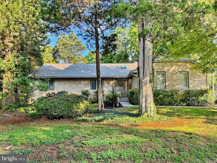 Located in the desirable waterfront community of Swan Point, this charming all-brick home offers a rare opportunity to enjoy comfort, space, and an exceptional lifestyle. Nestled on a beautifully landscaped corner lot with mature shade trees, the property is just a short stroll from peaceful water views. Inside, the home features 3 bedrooms, 2.5 bathrooms, a spacious family room with a two-sided gas fireplace that opens to the dining area, and a sunroom filled with natural light. Built with 2x6 construction for added durability and sound insulation, this home also includes a tall crawl space that offers excellent additional storage.  The thoughtful floor plan and timeless design provide a solid foundation for your personal style. Additional highlights include a two-car garage and a recently replaced HVAC system. Residents of Swan Point enjoy access to resort-style amenities including a championship golf course, full-service marina, private beach, swimming pool, tennis and pickleball courts, and a vibrant calendar of community events all year long.