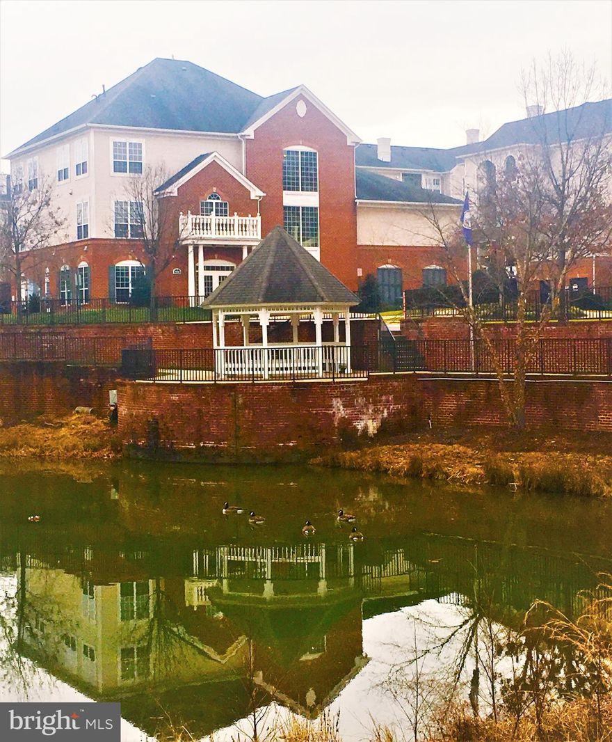 Immaculate and Move In Ready! This condo features 2 bedrooms and 1 full bath. Impeccably updated, modern, top floor unit with gleaming hardwood floors throughout. Gas fireplace, New Samsung stainless steel appliances, Tile, Roomy master bedroom with walk in closet. Full sized washer/dryer in unit. New 2018 HVAC system, Reserved (covered) parking space and private balcony overlooking courtyard.  Walk or take the shuttle to the Van Dorn and Eisenhower Metro. Secure building with pool, gym, basketball court, billiards, business center, fabulous community center, dog park, walking trails and more!