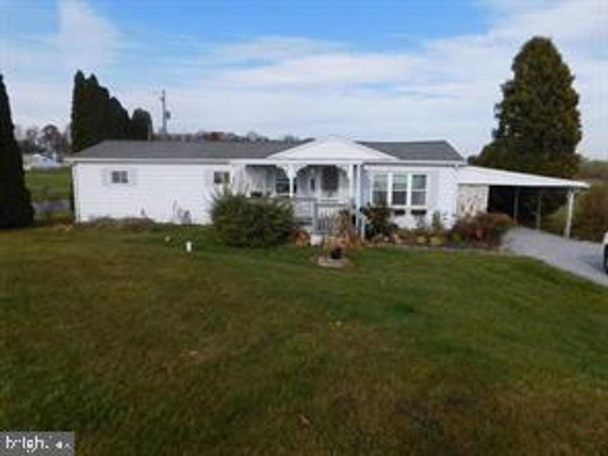 If you want to live in the country with no neighbors and surrounded by farm land this might be the property for you. This ranch home
provides 3 bedrooms and 1 bath with carport, sunroom and small covered deck. Home has very low taxes, oil heat, propane cooking,
well and septic, newer windows and roof all on a nice level lot. Everything you need and nothing you don't.