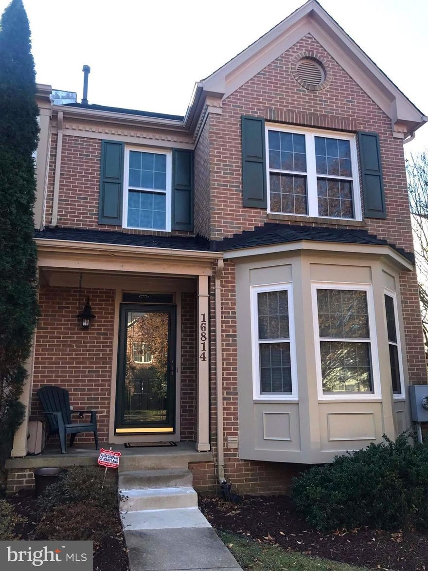 Hidden gem brick front end unit townhome in sought after Brooke Manor. Features include new roof,new windows,new carpet,new washer, new kitchen appliances,new kitchen floor and hot water heater. Cozy finished basement w/rough-in for full bath.   Directly behind Roots Market and Starbucks and close to trail and  tot-lot.  Within seconds of ICC.  Lots of light and fenced in backyard. A must see!