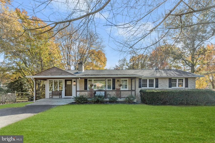 Modern Living in a Tranquil Setting.  
Nestled on a quiet cul-de-sac in the sought-after Beaver Brook community, this beautifully updated brick-front ranch home offers the perfect blend of modern living and outdoor charm—without the burden of a mandatory HOA or Columbia Association fee! Sitting on a sprawling 0.7-acre lot, it provides both privacy and convenience, making it ideal for nature lovers, dog owners, and those who enjoy an active lifestyle.
IAs you approach, a covered front porch with modern cable railing and lush landscaping sets the tone for the stylish updates found inside. Step into an inviting open-concept layout where the living room, dining room, and kitchen flow seamlessly together. Natural light pours in through lofty windows, highlighting the rich hardwood floors and elegant crown molding. A sliding glass door leads to the upper deck, allowing for effortless indoor-outdoor living.
The heart of the home is the fully renovated kitchen, an entertainer’s dream! It boasts soft-close white cabinetry, quartz countertops, a stunning stone backsplash, and a large center island with a breakfast bar. Stainless steel appliances, a gas range, and a walk-in pantry add to the functionality, while an additional wall of cabinetry with a wine rack enhances the elegance. Adjacent to the kitchen, the cozy family room features a fireplace, built-in bookcases, and custom plantation shutters, creating a warm and inviting space to relax.
The main level includes three spacious bedrooms, one of which is currently used as a home office with built-in desks. A full bath is conveniently located nearby. At the end of the hall, an optional primary bedroom serves as a private retreat with an en-suite bath.
A sliding barn door leads to the expansive lower level, which can function as a luxurious primary suite or a large recreation room. Complete with two closets and a spa-like en-suite bath featuring a furniture-style double vanity, granite counters, sconces, and a walk-in shower with floor-to-ceiling tiles, this space offers flexibility for guests, in-laws, or a private getaway. Step outside into your own private oasis! Sliding glass doors open to the lower deck and a round stone patio, leading to the fully fenced backyard.
The backyard features stone steps, a paver walkway, and a firepit—perfect for relaxing or hosting gatherings. With direct walkable access to Wilde Lake and Centennial Lake, this home is ideal for jogging, biking, dog walking, or a peaceful stroll to Town Center.
Additional highlights include a spacious laundry room, an unfinished area for ample storage, a storage shed, and unbeatable proximity to schools, The Mall in Columbia, and major commuter routes like US-29, I-95, and MD-32.
Don’t miss this rare find in a mature neighborhood—modern updates, a fantastic location, and no extra fees!