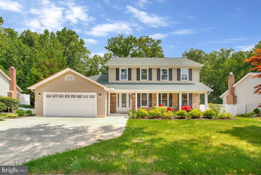 LOOK NO FURTHER!!!  This fabulous house has all you will ever need in a home including a convenient location.  Sparkling clean inside and out.  Besides the beautiful hardwood flooring throughout the main level, you will enjoy an updated kitchen with stainless steel appliances and granite counter tops along with the formal living room and dining room.  Just off of the kitchen you will find a spacious family room where you can step out onto a spectacular deck which offers glancing views of the water and the joy of hearing various birds singing in the trees.  The converted garage is perfect for a home office or au pair suite.   It features include a huge walk-in closet along with a beautiful full bath.   The upper level offers 3 generous sized bedrooms plus a full updated hall bathroom.  The owner's primary suite on the upper level offers a luxury bathroom containing a soaking tub as well as a separate shower along with a spacious walk-in closet.  The lower level provides a large recreation room, a full bath and 2 generous sized storage areas plus a fully equipped kitchen. The exterior of this home has been lovingly cared for and offers a large and sparkling in-ground pool.   Besides being located in the South River Blue Ribbon School District, the water privileged community of Annapolis Landing offers a lovely playground and picnic area, a community marina with boat slips and a boat ramp.  What more could you ask for with a location that provides a convenient commute to numerous workplace centers.