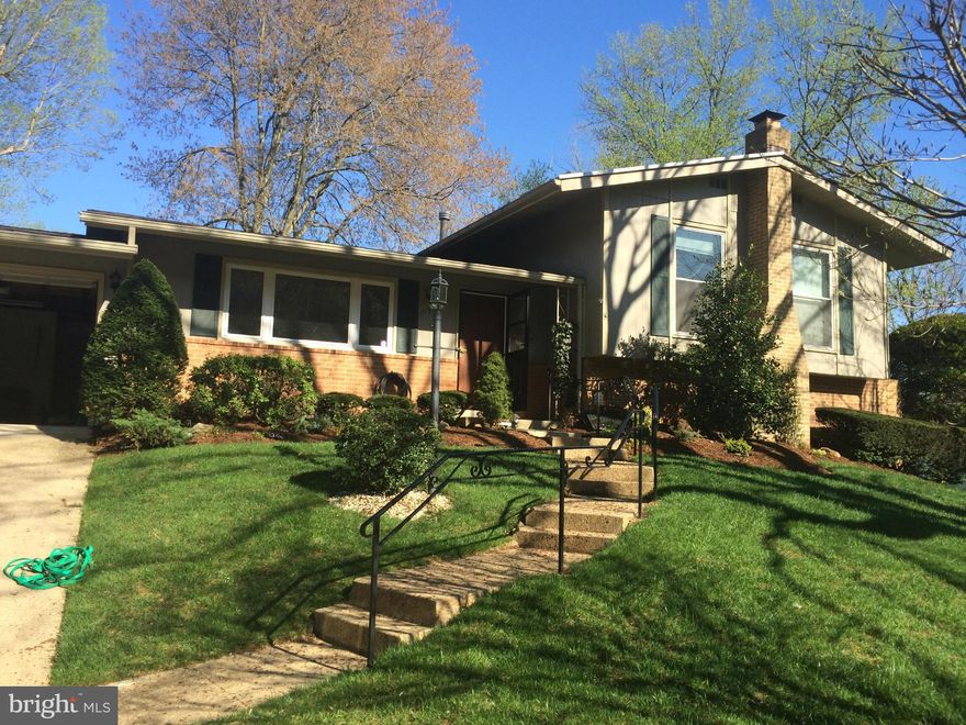 From the front curb to the back fence this is a gem. Renovated 4level split w/4 BR & 2ba.. Gorgeous hardwood on main & upper level. Kitchen feature ceramic floor, granite counters, new SS appliances-cherry cabinets. 2nd lower level has huge laundry room, tons of storage, and a separate workshop. This home and the beautiful landscaping has been lovingly cared for by the original owner. OPEN SUNDAY.